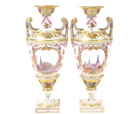 A pair of late 19thC Royal Copenhagen porcelain vases, of twin scrolling handled baluster form, reserve painted with views of