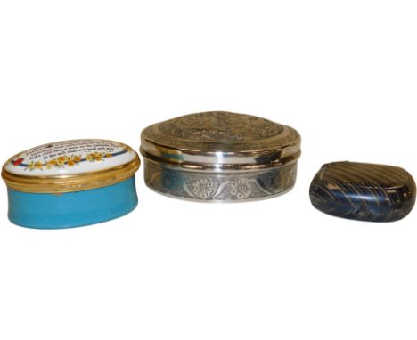A continental niello pill box, bears mark, together with a cylindrical box and cover, repousse decorated with flowers, white 