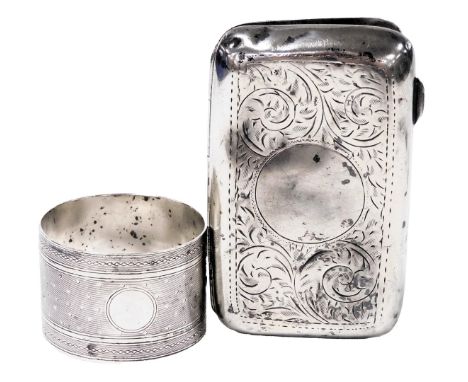 A George V silver cigarette case, with scrolling foliate decoration, vacant circular reserve, Birmingham 1919, together with 
