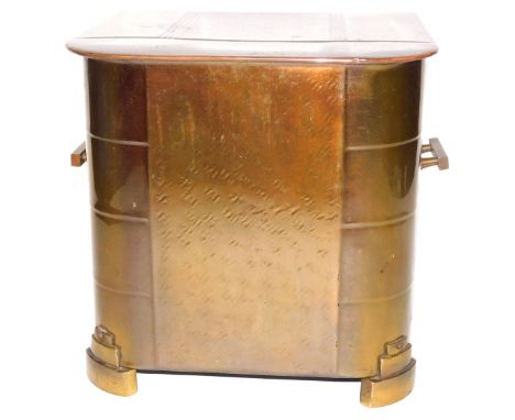 An Art Deco brass coal box, with side handles, raised on step feet, 30.5cm high x 31cm wide.