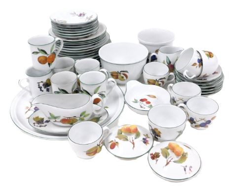A Royal Worcester porcelain Evesham pattern part dinner and tea service, including a circular platter, dinner, dessert and si