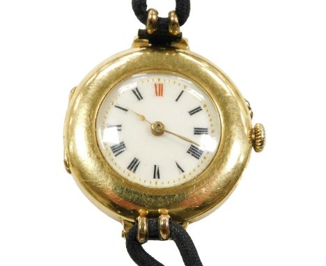An early 20thC ladies 18ct gold cased wrist watch, circular enamel dial bearing Roman numerals, Swiss 18 jewels movement with