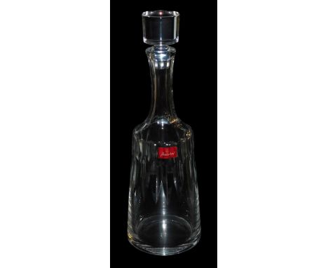 A Baccarat cut glass decanter and stopper, bears label, boxed, 34cm high.