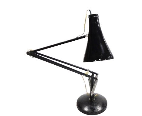 A Herbert Terry black anglepoise table lamp.