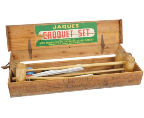A Jaques croquet set, pine boxed, bears label. 