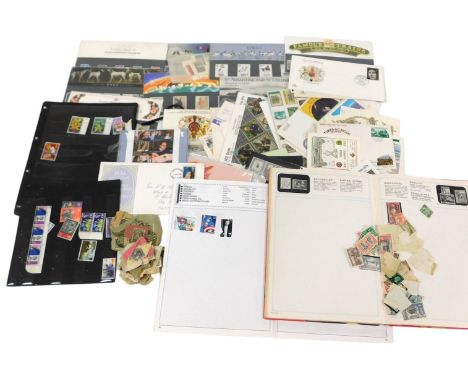 Philately postage stamps. EII mint commemoratives, first day covers, and loose stamps in packets, and stock books. (a quantit