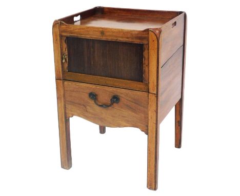 A George III mahogany tray top commode, with boxwood line inlay, having a tambour fronted door, above a pull out drawer with 