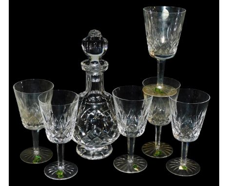 A set of six Waterford crystal Lismore pattern wine glasses, together with a decanter and stopper. (7)