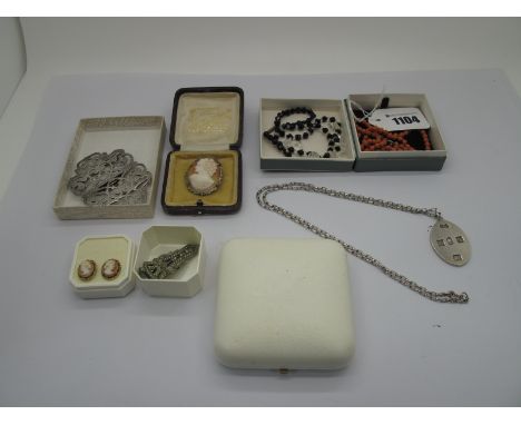 A Hallmarked Silver Nurse's Style Waist Buckle, of openwork scroll design, bead necklaces, an oval shell carved cameo brooch 