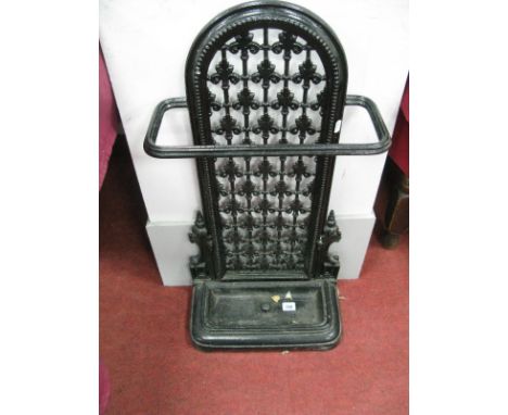 A XIX Century Black Painted Cast Iron Stick/Stand, with drip tray.