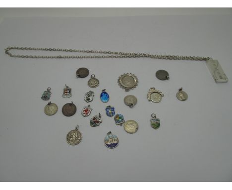A Hallmarked Silver Ingot Pendant, on a chain; together with assorted coin and enamel shield charm pendants, etc. 
