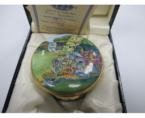 A Moorcroft Circular Enamel Trinket Box, handpainted with 'Eve's Garden', limited edition No. 84/100, 8cm diameter, initialle