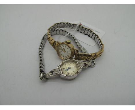 Rotary; A Vintage 9ct Gold Cased Ladies Wristwatch, on later expanding bracelet; A Vintage Bulova ladies wristwatch, with ins