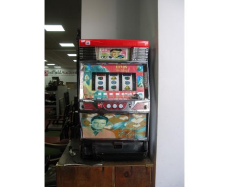 A Japanese 'Elvis The King' Slot Machine, produced by Net, 81cm high, with key.