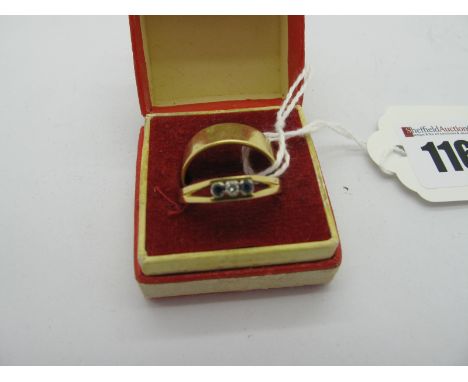 An 18ct Gold Wide Plain Wedding Band; together with an 18ct gold three stone ring, alternatively set. (2)* 2x 18ct gold rings