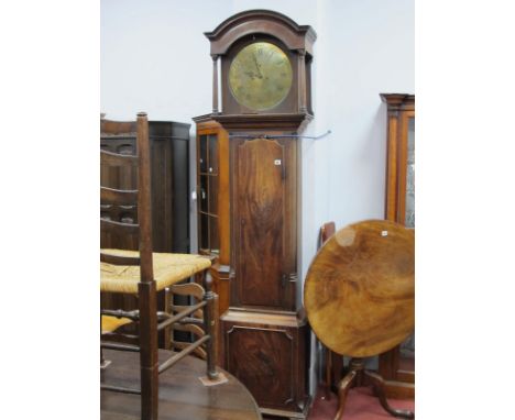 An XVIII Century Mahogany Eight-Day Longcase Clock, the circular brass dial with Roman numerals and two subsidiary dials insc