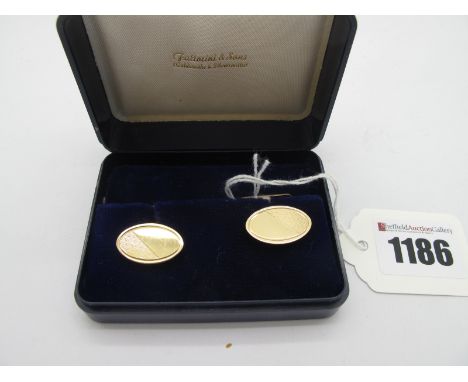 A Pair of 9ct Gold 'SwivLink Gent's Cufflinks, the part engine turned and oval panels on hinged bar backs.* cuff links total 