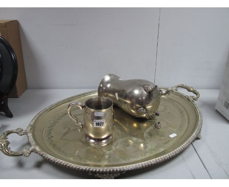 A Hallmarked Silver Mug, Sheffield 1966, of plain form with scroll handle; a plated ewer/pitcher (foot damages), large oval t