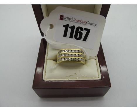 A Gent's Modern Three Row Diamond Set Ring, of uniform design channel set, stamped "750". *George (Sheffield) Insurance Valua