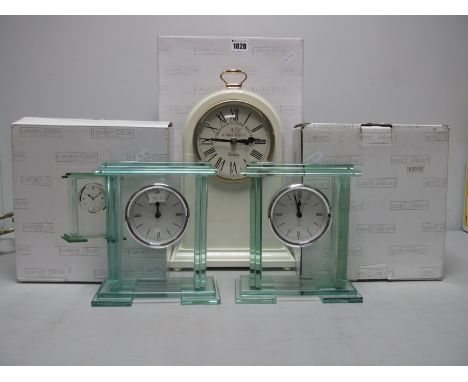 A London Clock Company Vintage Style Mantel Clock, boxed; together with two London Clock Company glass mantel clocks (boxed).