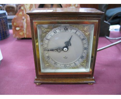 Mahogany Cased Elliott Mantel Clock, with gilt spandrels and silvered dial, 12.5cm overall width.
