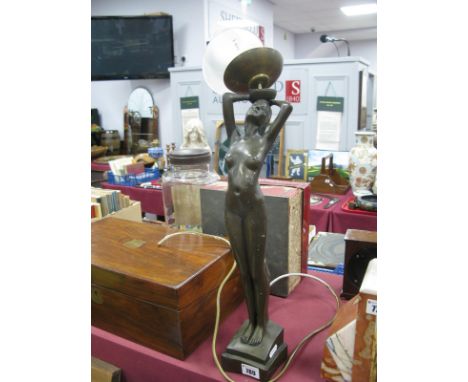 Art Deco Style Table Lamp, as a nude lady, arms aloft holding glass shade.