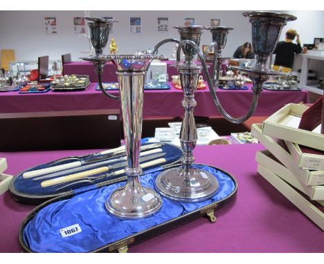 A Silver Plated Three Branch Candelabrum, with reeded arms, on circular spreading base a Joseph Rodgers &amp; Sons five piece