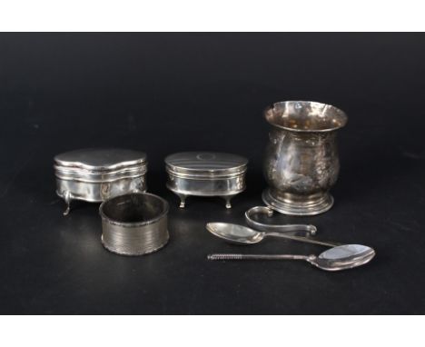 A silver christening mug (as found), a silver teaspoon, two small silver ring boxes (as found) and a silver napkin ring