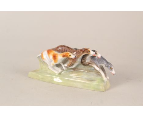 A Royal Worcester group 'Greyhounds' by Stella R Crofts