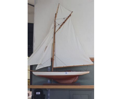 A wooden model yacht