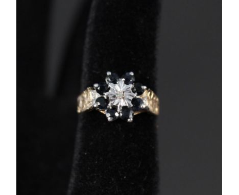 A 9ct gold sapphire and diamond floral cluster ring, size O