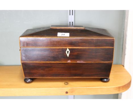 A 19th Century inlaid mahogany sarcophagus two compartment tea caddy