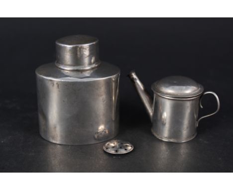 A small silver tea caddy hallmarked Birmingham 1898 by CS FS together with a novelty silver cruet in the form of a watering c