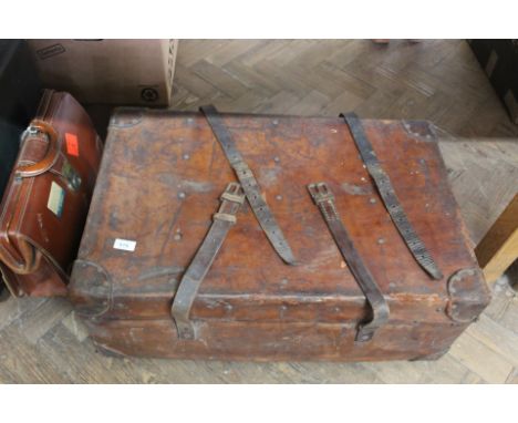 A vintage leather trunk, circular suitcase, one other plus an attaché case