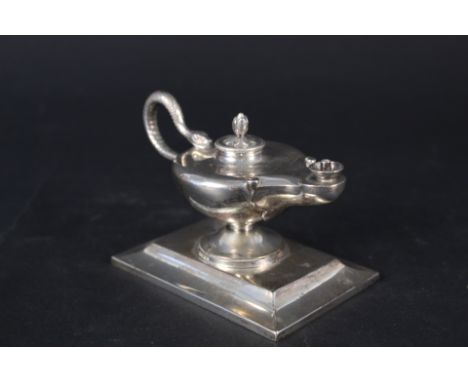 A Victorian silver Aladdins lamp on large stepped base, hallmarked London 1874