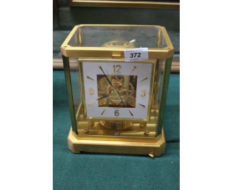 A Jaeger LeCoultre Atmos clock in original box, packing and paperwork