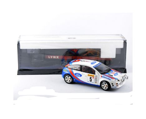 A good collection of modern diecast models, including 1:18 scale Ford Focus Monte Carlo racing by Auto Art, Corgi Modern Truc