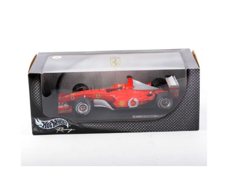 Hotwheels 1:18 scale diecast models, including Ferrari F20056 Michael Schumacher, two others and three others by different ma