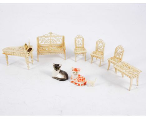 Victorian dolls house furniture, of decorative peared bone, including a bench 5cm, grand piano 5cm, table and three chairs (t