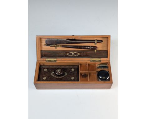 A 20th century oak and mother of pearl inlaid Writing Set / Stationery Box, the case with decorative boxwood bading, gilt met