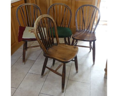 A set of four antique ash and elm kitchen Chairs,&nbsp;stick backs above moulded seats and raised on turned supports, W 45 cm