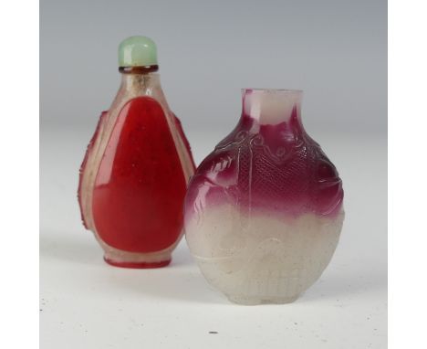 A 20thC Chinese glass Snuff Bottle, in the profile of an elephant, the glass in deep red and white, raised on four feet, lack