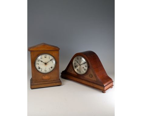 An mahogany and inlaid mantle Clock, white circular dial with arabic numerals, case with decorative chequered banding, togeth