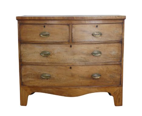 A Georgian mahogany bow-front Chest of drawers, of two small drawers over two large drawers, raised on shaped bracket feet, W