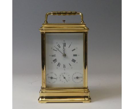 A 20th century French L'Epee brass carriage Clock, the enamelled dial set with Roman and Arabic numerals, with three subsidia