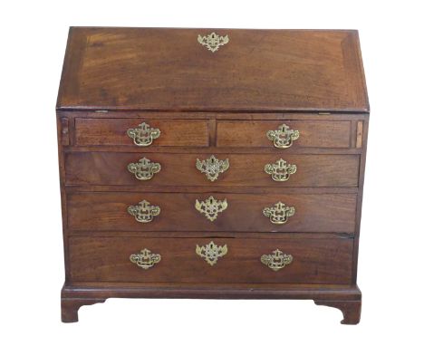 A George III mahogany Bureau,&nbsp;hinged sloped fall front concealing fitted interior and writing surface, over two small dr