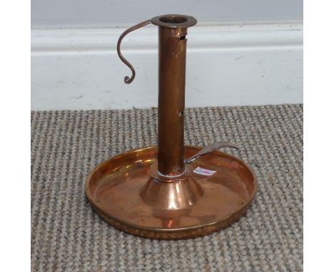An antique copper Chamber Stick, H 19.5 cm. 