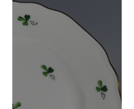An Augarten Wien/Viennese porcelain Tea Set, comprising nine Teacups and Saucers, seven Plates, Teapot, Sucrier, and another 