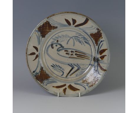 Seth Cardew (1934 - 2016) a Wenford Bridge pottery Plate, depicting central stylised figure of a bird, within foliage, impres