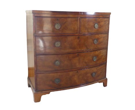 A George III mahogany bow-fronted Chest of drawers, of two short drawers over three long drawers, raised on bracket feet, W 1